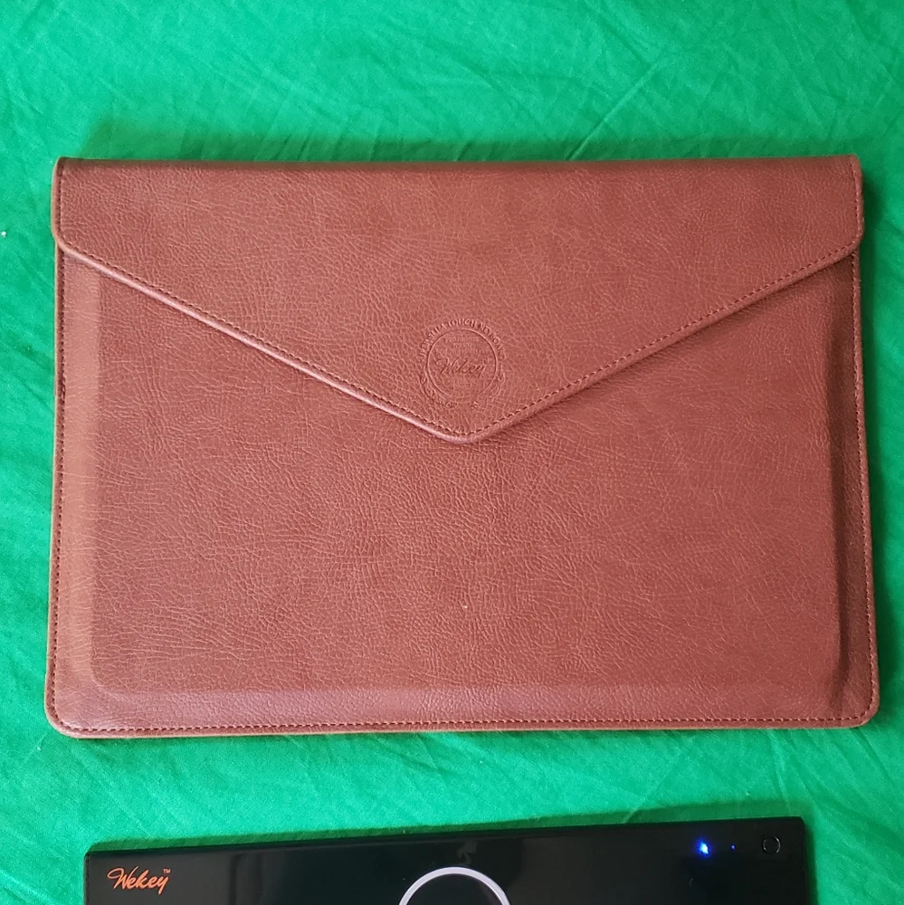 Wekey Bluetooth Super Slim Touch Keyboard with Leather Case USB Cable Manual